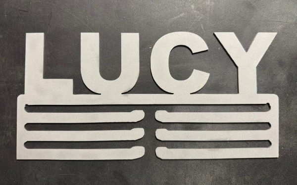 Metal ribbon holder plasma cut